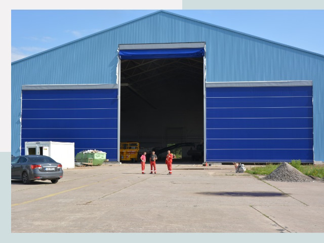 Ангарные ворота в Первоуральск от СтальСтрой-Прв по цене 618 руб.